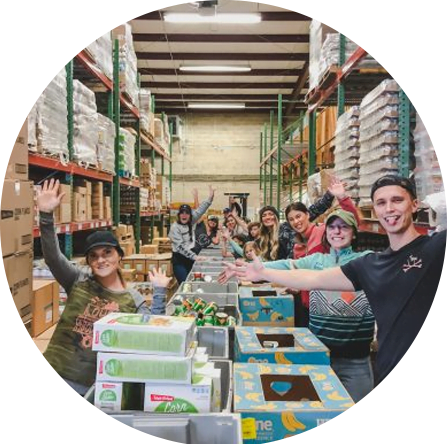 volunteers warehouse access food drive