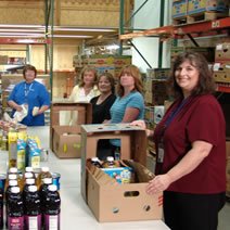 ACCESS Food Drive group warehouse